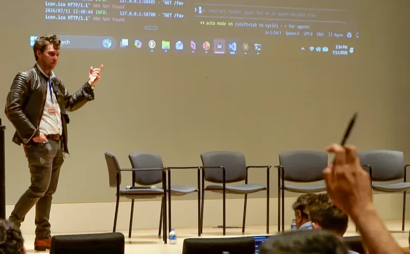Tyler teaching at a free Claude Community workshop with IEEE Atlanta, July 2026.